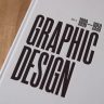 Close-up of a graphic design book cover highlighting years 1890-1959.